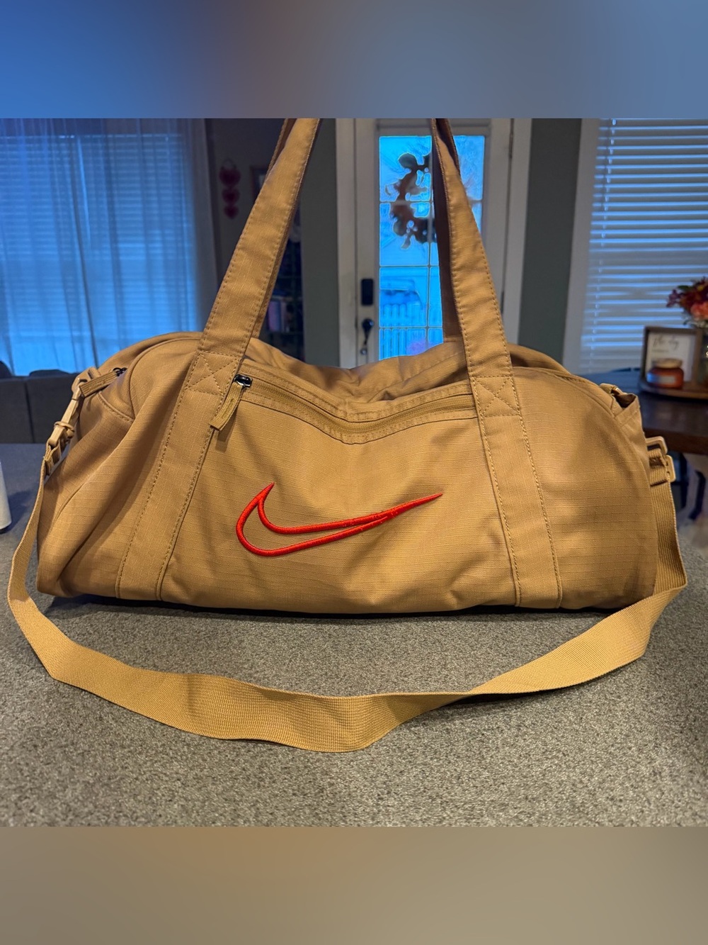 Nike Tan Duffel Bag with Red Swoosh Logo